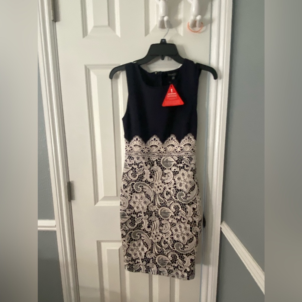 Fitted dressy dress. “London.”